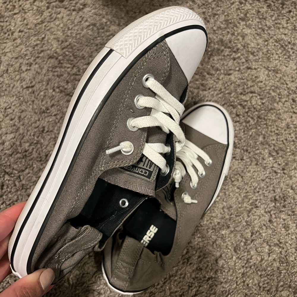 Converse slide-ins gray and white. Warn them twice. Nice shoe for casual wear.